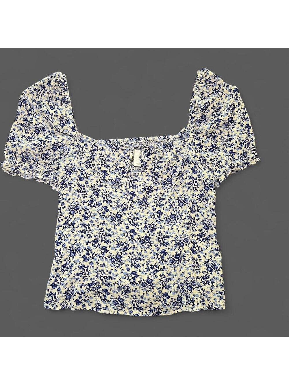 H&M white/blue floral blouse with tie front detail and puffy sleeves